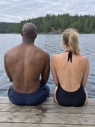 Uploaded photo: Two friends on a lake dock. The matching pair sits between the shoulder blades, and the clothes stay as they were.