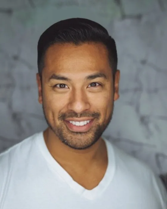 The same man with an AI-preview crew cut, short tapered sides and a little length on top