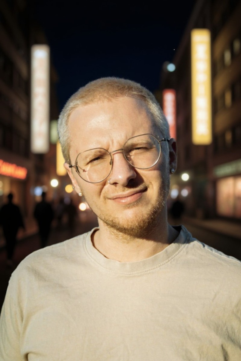 AI Background Changer example: the same man in front of a neon-lit Tokyo street at night